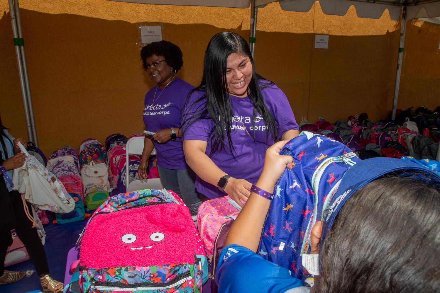 Kinecta employees supporting our annual backpack drive